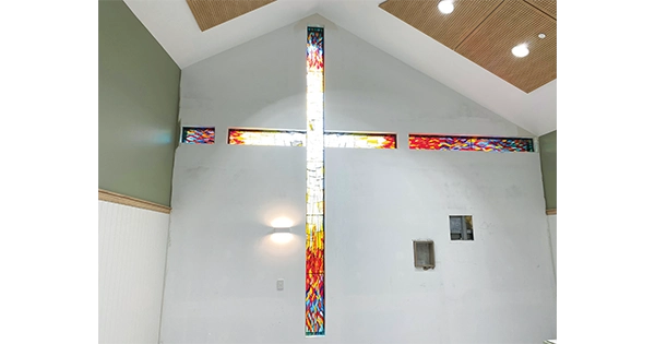 Beautiful stained glass cross installed in MacKillop...