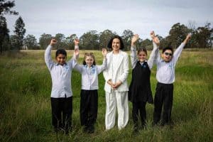 Deputy Premier and Minister for Education and Early Learning Prue Car with children